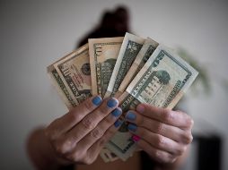 Señalan que puede haber sesiones de aversión global al riesgo que acerquen el valor del peso hacia 20.50 por dólar. EFE/ARCHIVO