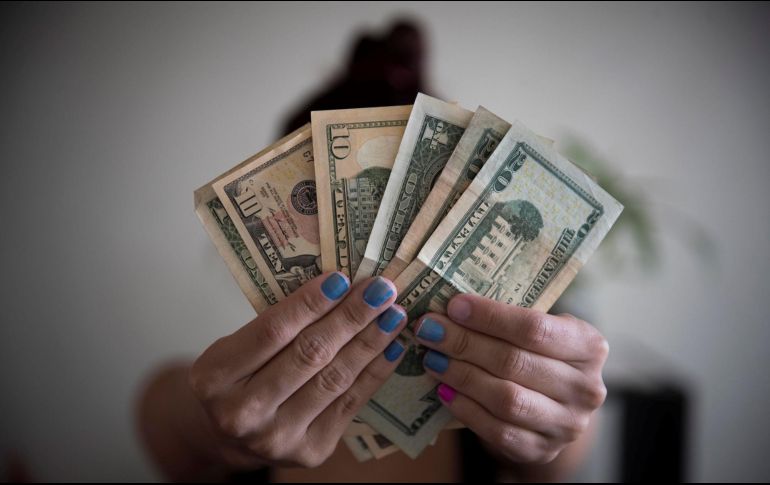 Señalan que puede haber sesiones de aversión global al riesgo que acerquen el valor del peso hacia 20.50 por dólar. EFE/ARCHIVO