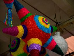 Las tradicionales fiestas previas a la Navidad representan un riesgo para contagios. AFP/ARCHIVO