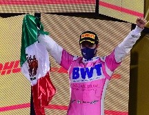 ''Checo'', mencionó que sigue cumpliendo metas en F1 y que el vestir los colores de Red Bull es un honor.  AFP / ARCHIVO