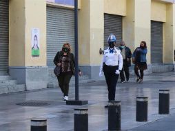 Aspectos de negocios cerrados en la Ciudad de México, que regresó a semáforo rojo. EFE/J. Pazos