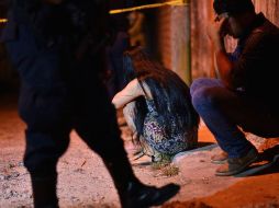 Personal de la Unidad de Investigación Homicidios Intencionales de la Fiscalía del Estado se encuentra laborando en el sitio así como peritos forense quienes realizan lo conducente. AFP / ARCHIVO