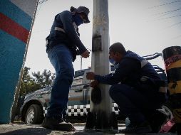 Los postes fueron vandalizados la mañana de ayer lunes en distintos puntos de la Zona Metropolitana de Guadalajara. EL INFORMADOR / F. Atilano