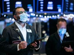 El Dow Jones subió hasta 30 mil 211.91 unidades. AP/ARCHIVO