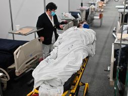 Ocho de cada 10 espacios del IMSS destinados a enfermos de COVID-19 en Jalisco están ocupados. AFP/P. Pardo