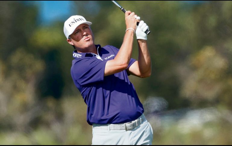 ALCANZA. Ryan Palmer tuvo un recorrido de 64 golpes para igualar a Harris English en el liderato. AFP• G. Shamus