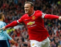 REFERENTE. Wayne Rooney ganó todos los títulos posibles como jugador del Manchester United y es considerado una leyenda de los Red Devils. AFP/ARCHIVO