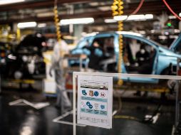 Uno de cada cuatro puestos del sector manufacturero es creado por las armadoras de autos. AFP/M. Bureau
