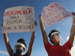 EXIGENCIA. Brasileños exigen la dimisión del presidente por el manejo de la pandemia. AP