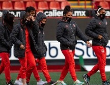 En el comunicado, la Liga MX señala que los tres casos positivos “se encuentran asintomáticos y aislados bajo observación”.  Imago7