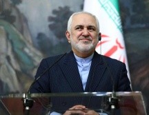 “Claramente puede haber un mecanismo para sincronizar el regreso de los dos países al acuerdo o para coordinar lo que se puede hacer”, agregó Javad Zarif. AFP