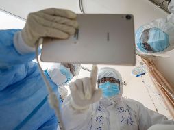 El investigador Peter Ben Embarek señaló que descubrieron que había más de una docena de cepas del virus en Wuhan ya en diciembre. AFP/ARCHIVO