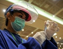 La OMS se siente alentada por los resultados preliminares que indican que las vacunas parecen estar ayudando a frenar la explosiva propagación del virus. AFP