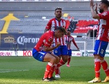 Los rojinegros del Atlas cometieron el error de bajar la guardia ante el Atlético San Luis. Imago7/Sandra Bautista