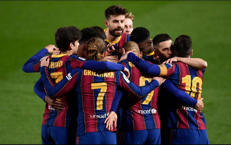 Barcelona consiguió la hazaña al remontar el marcador en contra frente a Sevilla. AFP / J. Lago