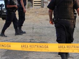 La Policía no logró determinar el sexo de las personas ni la posible causa de su muerte. NOTIMEX/Archivo