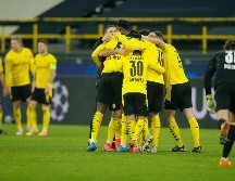 Jugadores del Borussia festejan el pase de su equipo. AFP / L. Kuegeler