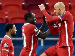 FESTEJO. Los Reds tienen posibilidades de terminar la campaña con un título. AP