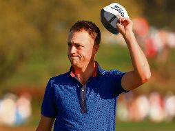 Justin Thomas se llevó el título por un golpe de diferencia sobre Lee Westwood. AFP/M. Ehrmann