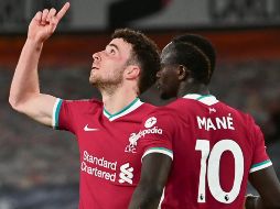 APENITAS. Diogo Jota (izq.) marcó en tiempo de reposición de la primera mitad. AP • P. Ellis