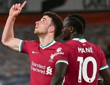 APENITAS. Diogo Jota (izq.) marcó en tiempo de reposición de la primera mitad. AP • P. Ellis