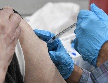 El primer ministro Scott Morrison declaró que quiere utilizar las dosis que Australia ha pedido y pagado para ayudar a Papúa Nueva Guinea, una isla al norte de Australia, para luchar contra el coronavirus. AFP / P. Guyot