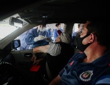 Los únicos requisitos fueron llegar en coche, su folio e INE y que le pidieran a Dios alcanzar vacunas. EL INFORMADOR / G. Gallo