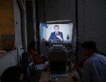 Macron insistió en el éxito que ha supuesto mantener el máximo posible las escuelas abiertas, frente a otros países que las han cerrado hace meses. AP / D. Cole