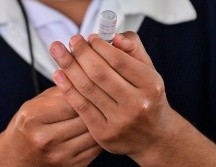 no cumplían el requisito de edad para la vacuna anti COVID-19. AFP/ARCHIVO