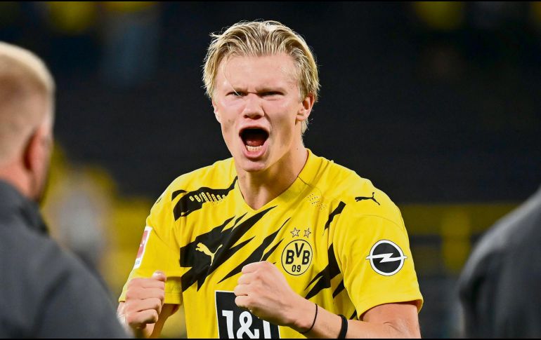 MURALLA. El delantero noruego tendrá que romper una zaga muy poco vulnerada. AFP