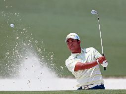 NUEVOS AIRES ORIENTALES. El golf mostrado por el nipón, rubricado con la chaqueta verde, abre el camino hacia un mejor futuro, señaló Tiger Woods, quien felicitó al campeón del máximo torneo masculino. AP