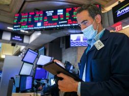 La mayoría de los sectores retrocedieron, encabezados por las empresas energéticas, financieras y de bienes no esenciales. AP/C. Crow