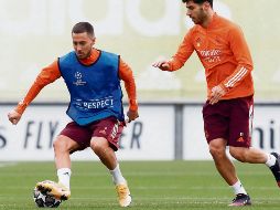 DE VUELTA. Eden Hazard (izq.) ya podrá ver minutos con el Madrid frente a su ex equipo, en caso de que Zidane lo considere. EFE
