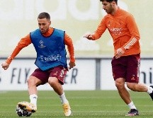 DE VUELTA. Eden Hazard (izq.) ya podrá ver minutos con el Madrid frente a su ex equipo, en caso de que Zidane lo considere. EFE