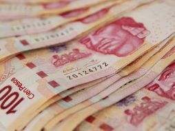 La moneda mexicana se intercambia en 20.89 unidades por dólar esta mañana y significa su peor nivel intradía desde el pasado 25 de marzo. EL INFORMADOR / ARCHIVO