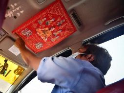 Los amuletos son tan populares que en Bangkok hay un mercado dedicado a ellos en el centro histórico. Los más caros son aquellos que están bendecidos por religiosos. AFP/L. Suwanrumpha