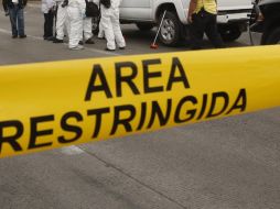 Los paramédicos corroboraron la muerte de la mujer de entre 30 a 35 años y con un disparo en la cabeza. EL INFORMADOR / ARCHIVO