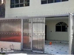 La casa quedó asegurada por personal de la dependencia para que se continúe con la recopilación y análisis de indicios. ESPECIAL / Fiscalía de Jalisco