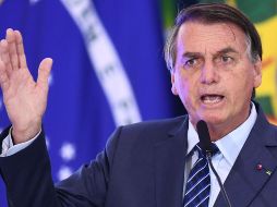 Bolsonaro, uno de los líderes más negacionistas sobre el coronavirus, encabezó el viernes un acto en Açailandia, en el que criticó las medidas de distanciamiento social impuestas por gobernadores y alcaldes para contener la pandemia. AFP / ARCHIVO