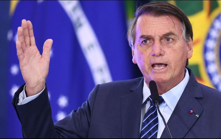Bolsonaro, uno de los líderes más negacionistas sobre el coronavirus, encabezó el viernes un acto en Açailandia, en el que criticó las medidas de distanciamiento social impuestas por gobernadores y alcaldes para contener la pandemia. AFP / ARCHIVO