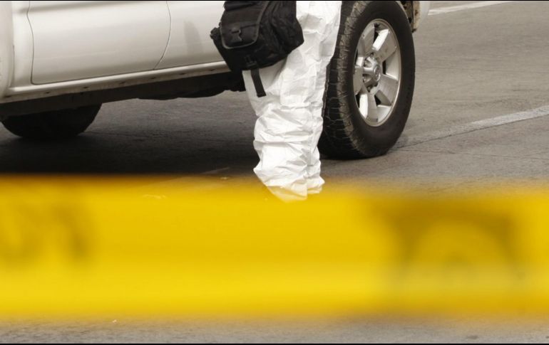 El cadáver es localizado en la colonia Industrial Zapopan Norte, en el cruce de las calles Industria del Vestido y Metalúrgica. EL INFORMADOR /ARCHIVO