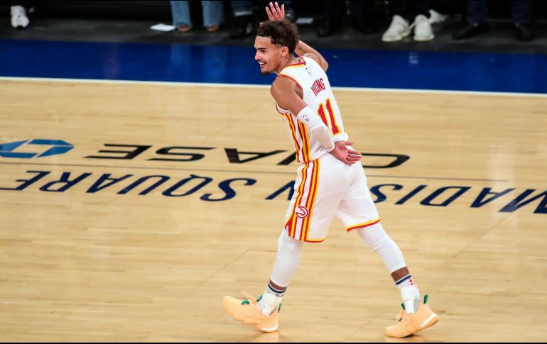 CON GANAS. Después de ser escupido en el segundo duelo y abucheado durante los 5 partidos, Trae Young firmó un partidazo de 36 puntos y 9 asistencias. AP