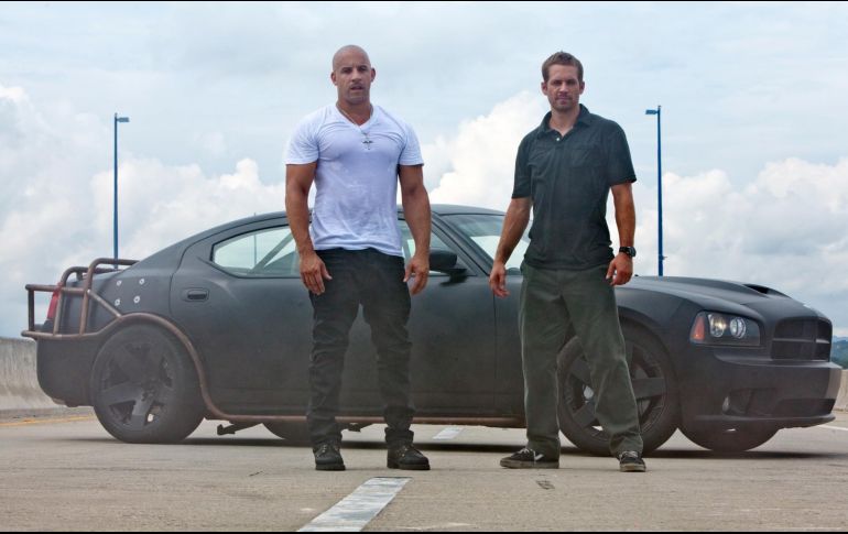 Vin Diesel y Paul Walker crearon una pareja emblemática en la saga “Rápidos y Furiosos”. ESPECIAL / UNIVERSAL STUDIOS