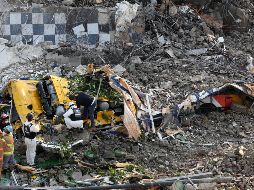 Los rescatistas están buscando entre los escombros ante la posibilidad de que haya personas atrapadas abajo. EFE / Yonhap South Korea Out