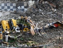 Los rescatistas están buscando entre los escombros ante la posibilidad de que haya personas atrapadas abajo. EFE / Yonhap South Korea Out
