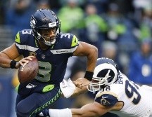 El quarterback de los Seahawks de Seattle Russell Wilson aseguró el jueves que nunca solicitó un canje. AFP / ARCHIVO