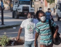 Los haitianos aún no reciben dosis de ninguna vacuna. AFP/P. Jean