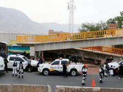 PANORAMA. Una  decena de Estados reporta  un retroceso  en seguridad, como Jalisco. En la foto, asesinato de cinco personas en Jocotepec en mayo pasado. ESPECIAL