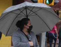 El frente frío interaccionará con un canal de baja presión en el noreste y oriente de México, lo que provocará lluvias. SUN/ARCHIVO