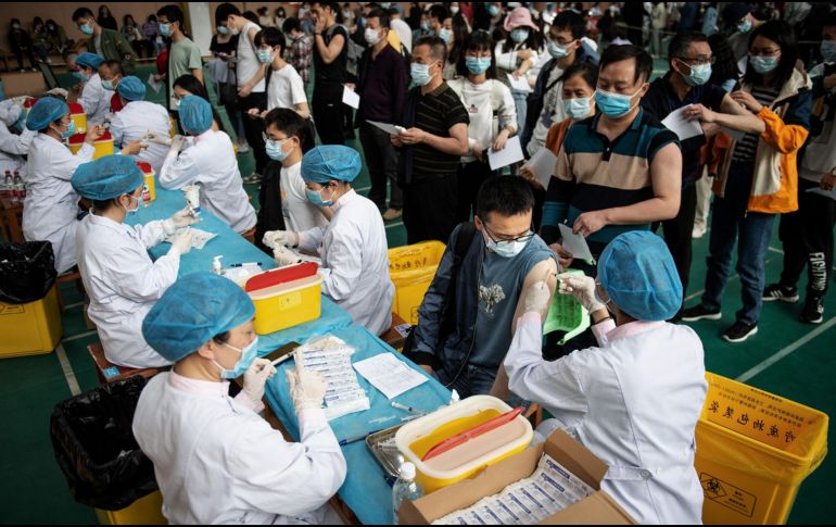 China espera tener vacunados a al menos 70% de su población antes de fin de año. AFP/ARCHIVO